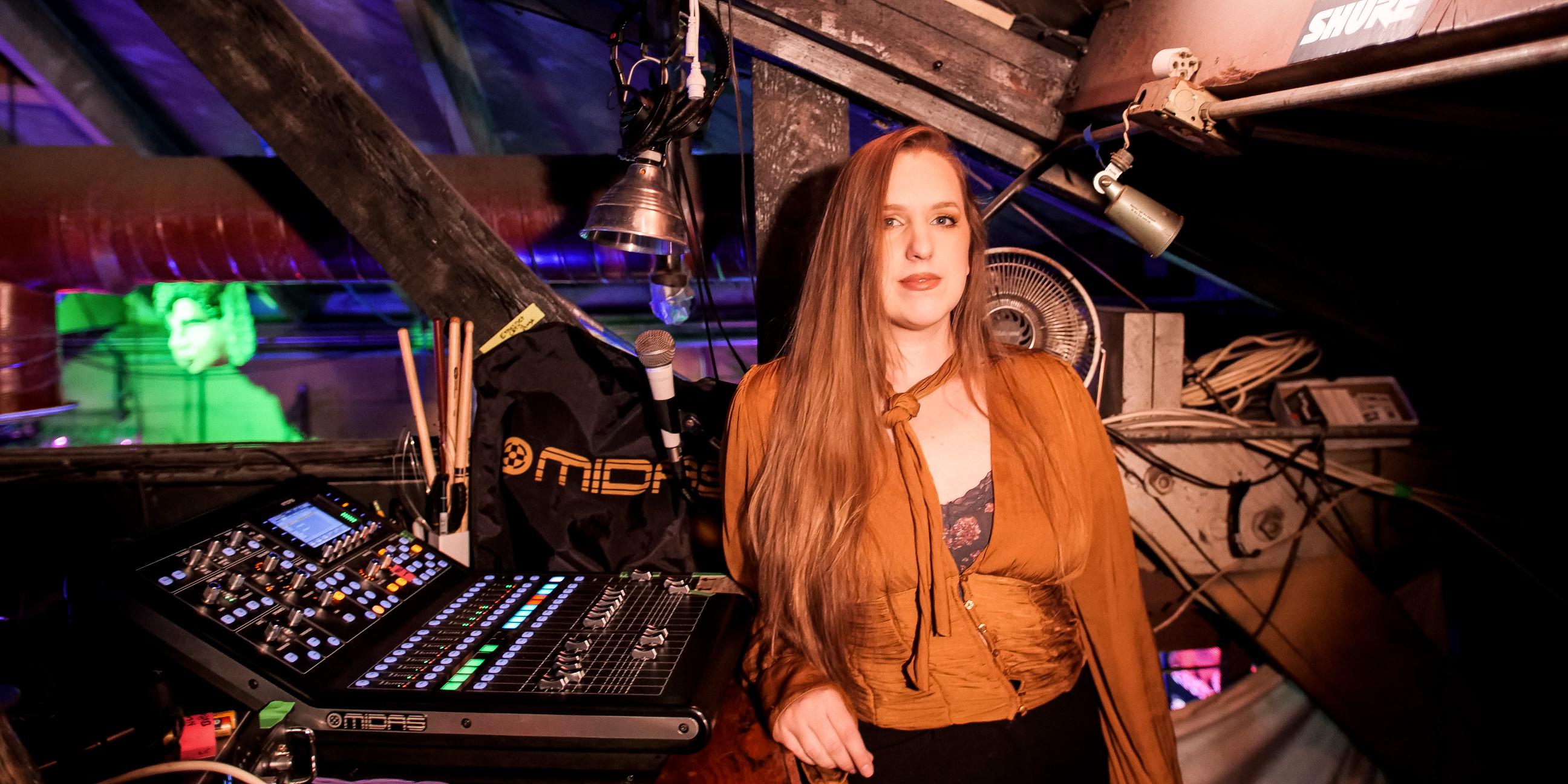 Sacramento Sound Solutions cofounder Rebecca Sleeth at the sound console at Powerhouse Pub in Folsom.